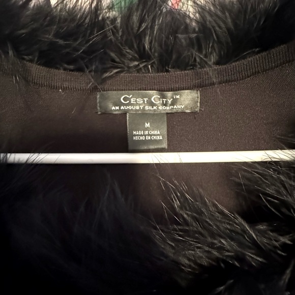 Party sweater w/ black feather collar making the perfect frame for your smile - Picture 6 of 7